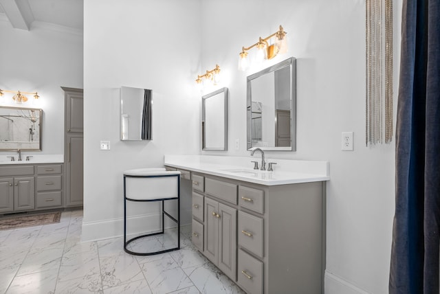 bathroom featuring vanity and crown molding