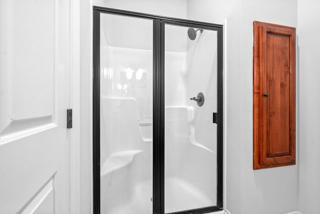 bathroom with an enclosed shower