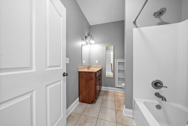 full bathroom featuring vanity, tile patterned flooring, toilet, and shower / washtub combination