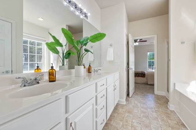 bathroom with independent shower and bath, a wealth of natural light, vanity, and ceiling fan