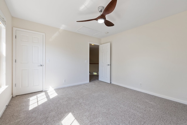 unfurnished bedroom featuring ceiling fan and light carpet