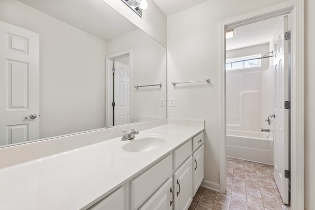 bathroom with vanity and shower / bath combination