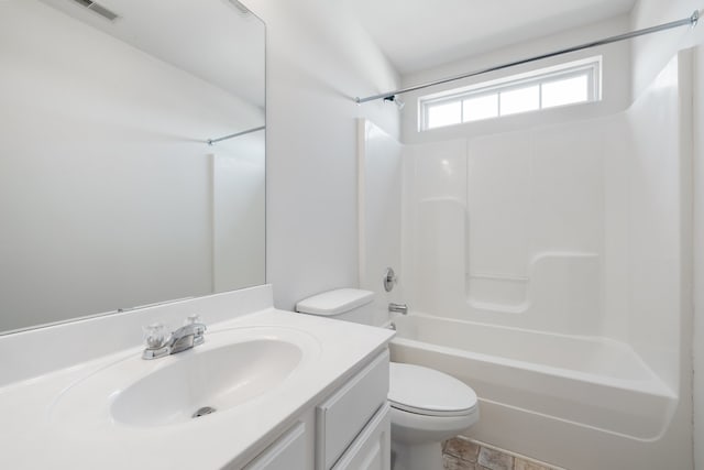 full bathroom with shower / bathing tub combination, vanity, and toilet