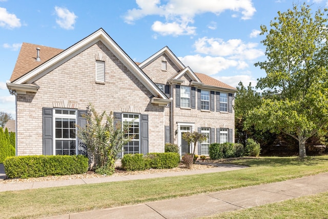 view of front of home with a front yard