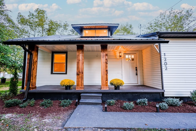 view of front of home featuring covered porch