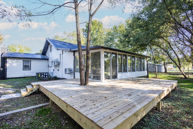 deck featuring a sunroom