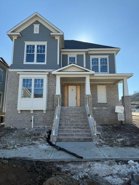 view of front facade featuring covered porch