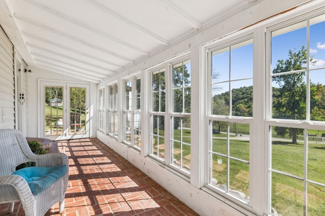 sunroom with vaulted ceiling