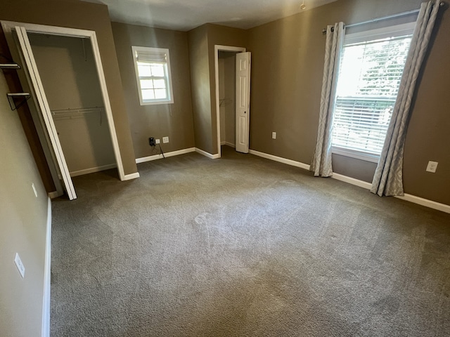 unfurnished bedroom featuring carpet