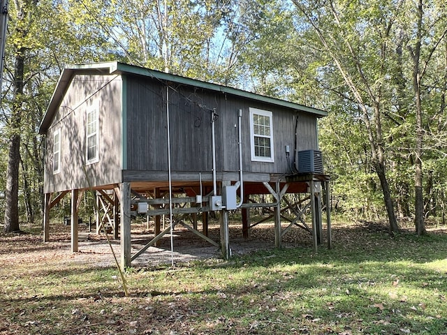 view of outbuilding featuring central AC