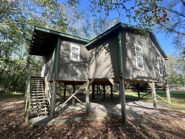 1518 Matlock Dr, Chapmansboro, TN 37035 - view of side of property with a carport and stairway