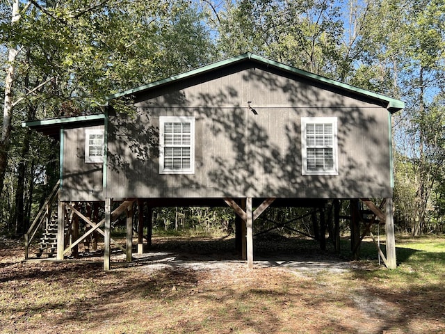 1518 Matlock Dr, Chapmansboro, TN 37035 - view of outdoor structure with a carport and stairs