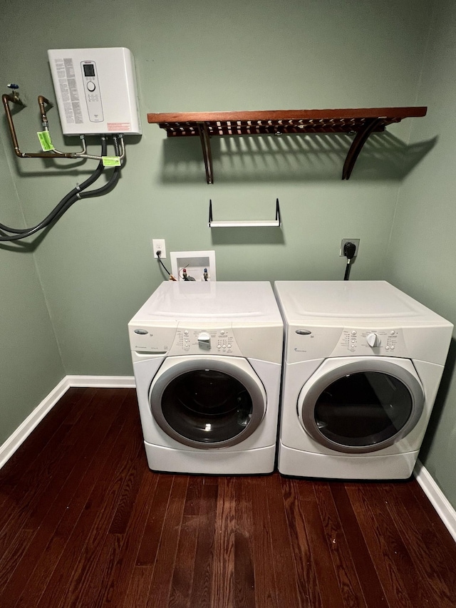 1518 Matlock Dr, Chapmansboro, TN 37035 - laundry area with dark wood-style floors, washing machine and dryer, and baseboards