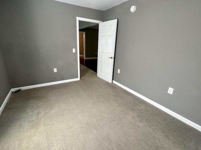 1518 Matlock Dr, Chapmansboro, TN 37035 - carpeted spare room with baseboards and a smoke detector