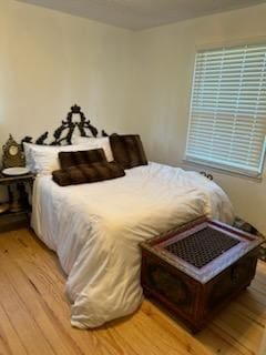 bedroom featuring hardwood / wood-style flooring