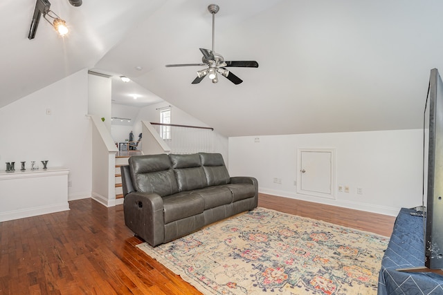 living room featuring ceiling fan, vaulted ceiling, and dark hardwood / wood-style flooring