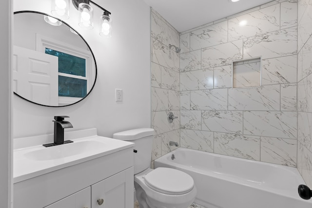 full bathroom featuring vanity, toilet, and tiled shower / bath combo