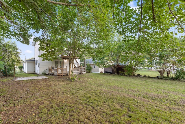 view of yard with a deck