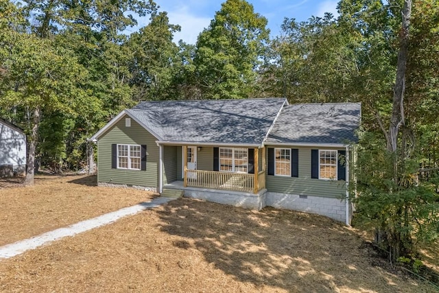 ranch-style house featuring a porch