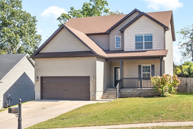 craftsman house featuring a front lawn and covered porch