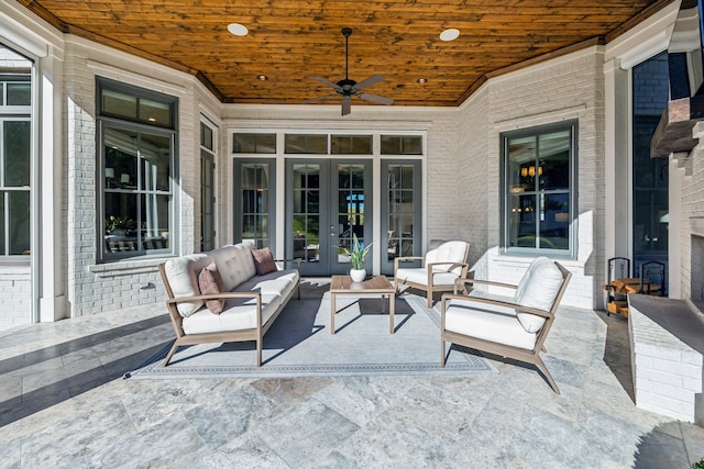 view of patio with ceiling fan and outdoor lounge area