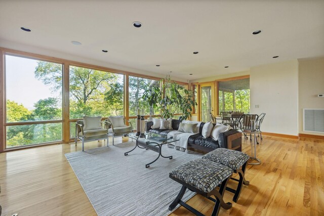 109 Jocelyn Hills Dr, Nashville, TN 37205 - living area with baseboards, visible vents, a healthy amount of sunlight, and light wood finished floors