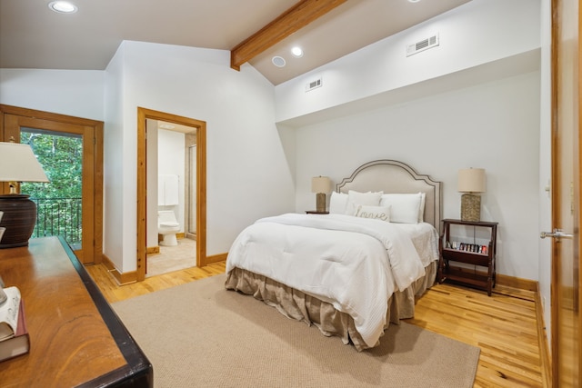 bedroom featuring lofted ceiling with beams, access to exterior, light wood-type flooring, and ensuite bath