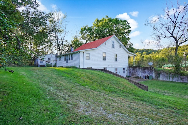 exterior space with a lawn