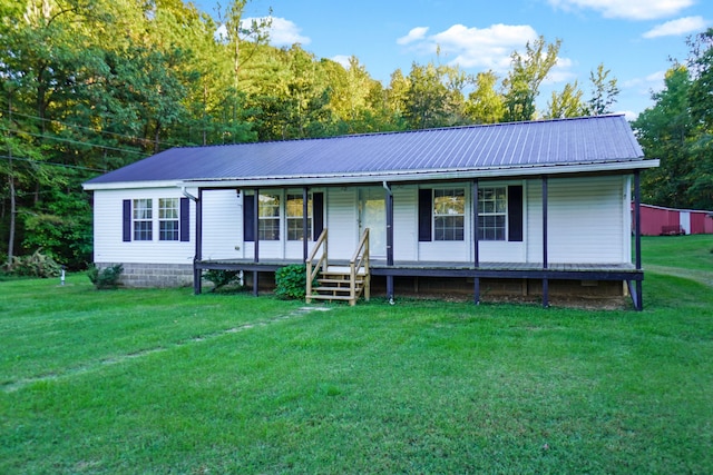 view of front of home featuring a front yard and a porch