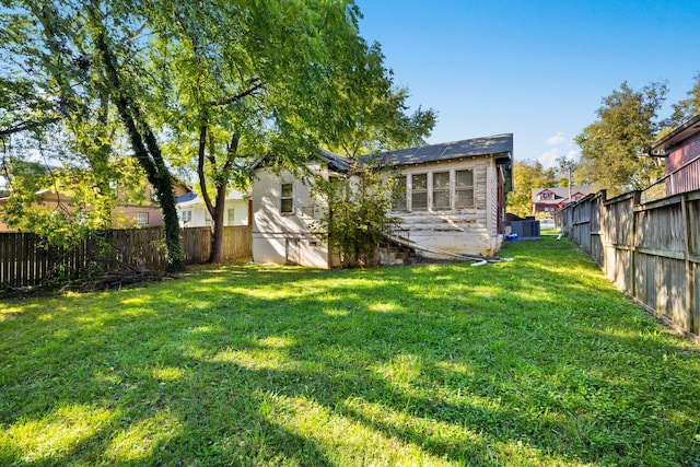 view of yard featuring central AC