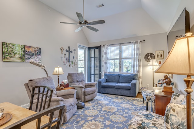 living room with high vaulted ceiling and ceiling fan