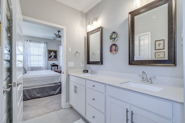 bathroom with tile patterned floors, ceiling fan, and vanity