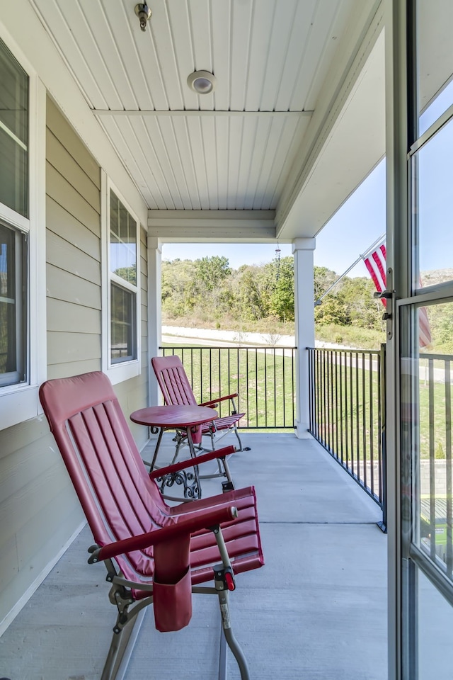 balcony featuring a porch