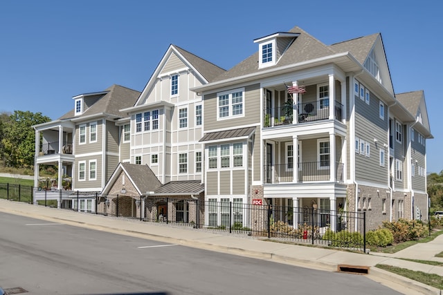 view of front of home with a balcony