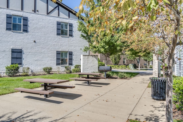 exterior space featuring a yard and a patio