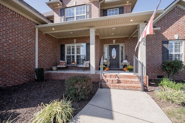 property entrance with covered porch