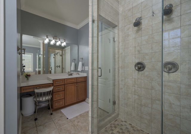 bathroom featuring tile patterned flooring, an enclosed shower, crown molding, and vanity