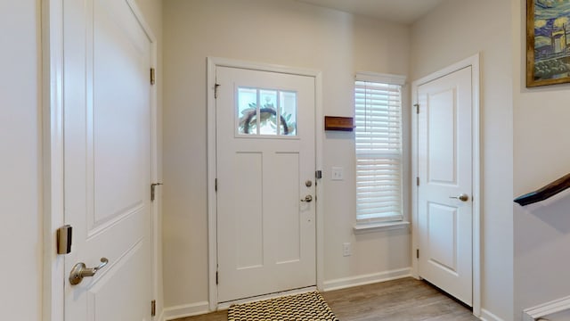 foyer with light wood-type flooring