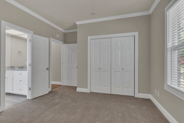 unfurnished bedroom with light carpet, crown molding, and multiple windows