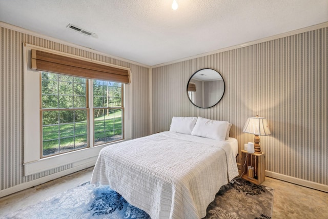 bedroom featuring visible vents, a textured ceiling, carpet floors, and wallpapered walls