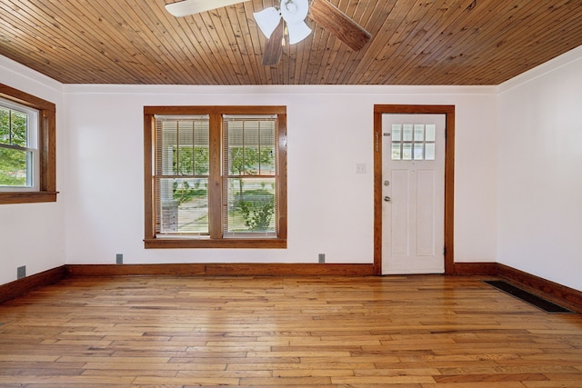 entryway featuring ornamental molding, wooden ceiling, light wood-type flooring, and ceiling fan