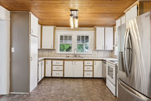 kitchen with white cabinets, pendant lighting, sink, stainless steel fridge with ice dispenser, and electric range