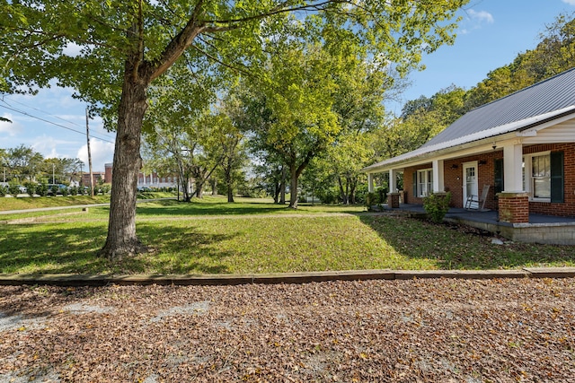 view of yard featuring a porch