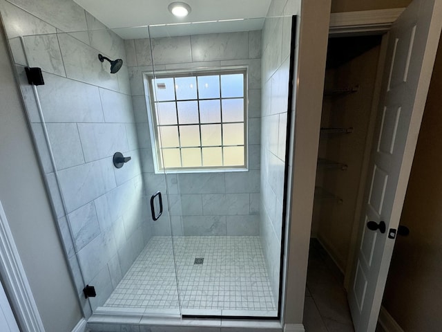 bathroom featuring an enclosed shower