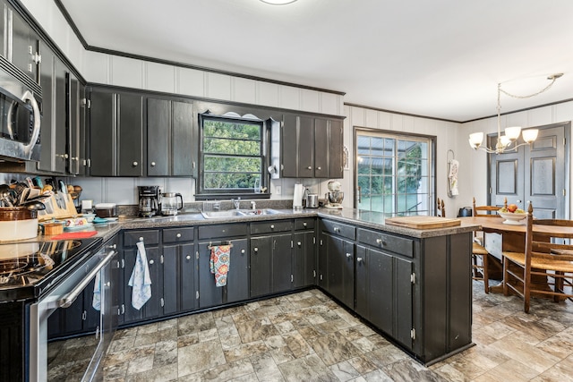 kitchen with sink, pendant lighting, electric stove, a chandelier, and ornamental molding