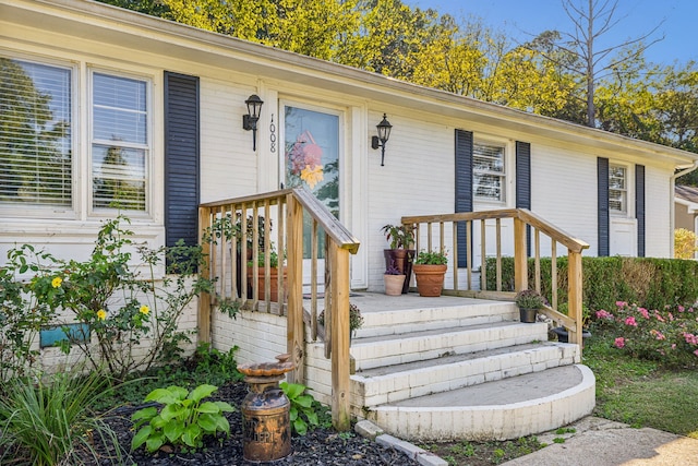 entrance to property with covered porch