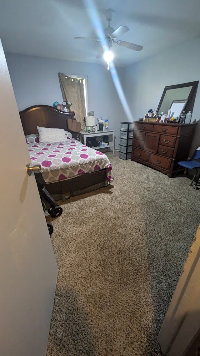 bedroom featuring carpet and ceiling fan