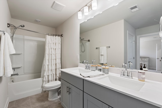 full bathroom with vanity, tile patterned floors, toilet, and shower / tub combo with curtain