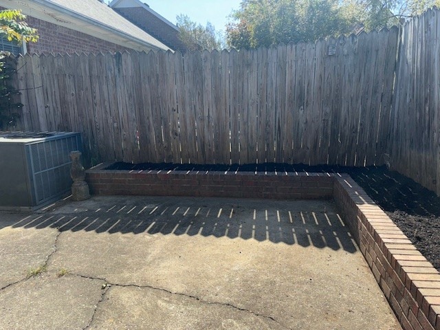 view of patio with central air condition unit