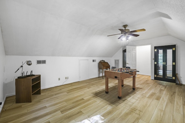 455 Bluff View Dr, Spencer, TN 38585 - game room featuring vaulted ceiling, light wood-type flooring, ceiling fan, and baseboards